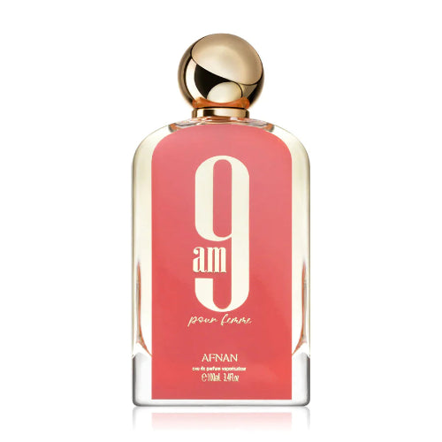 Frasco de Eau de Parfum 9 AM Pour Femme de Afnan, con una etiqueta rosa vibrante y un tapón dorado. Perfume frutal para mujer.