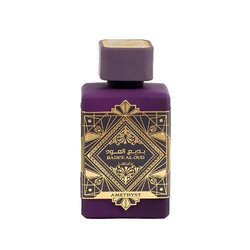Perfume Lattafa Bade'e Al Oud Amethyst 100ml frasco morado intenso con emblemas dorados notas de rosa búlgara jazmín y ámbar en Musk Dor.
