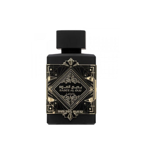 Perfume Lattafa Bade'e Al Oud - Oud For Glory 100ml frasco negro con grabados dorados esencia de madera de oud azafrán y pachulí oscuro en Musk Dor.